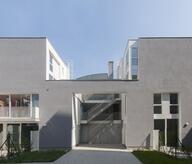 outside stairway splits the building into two volumes