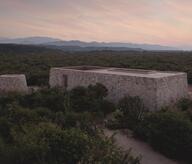 Aerial view of the building at sunset